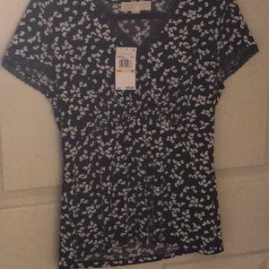 Michael Kors Top  Size Medium.  22 length Black  background w/ print.